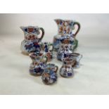 A collection of eight Masons ironstone jugs, the largest being 25cm the smallest smallest 7.5cm