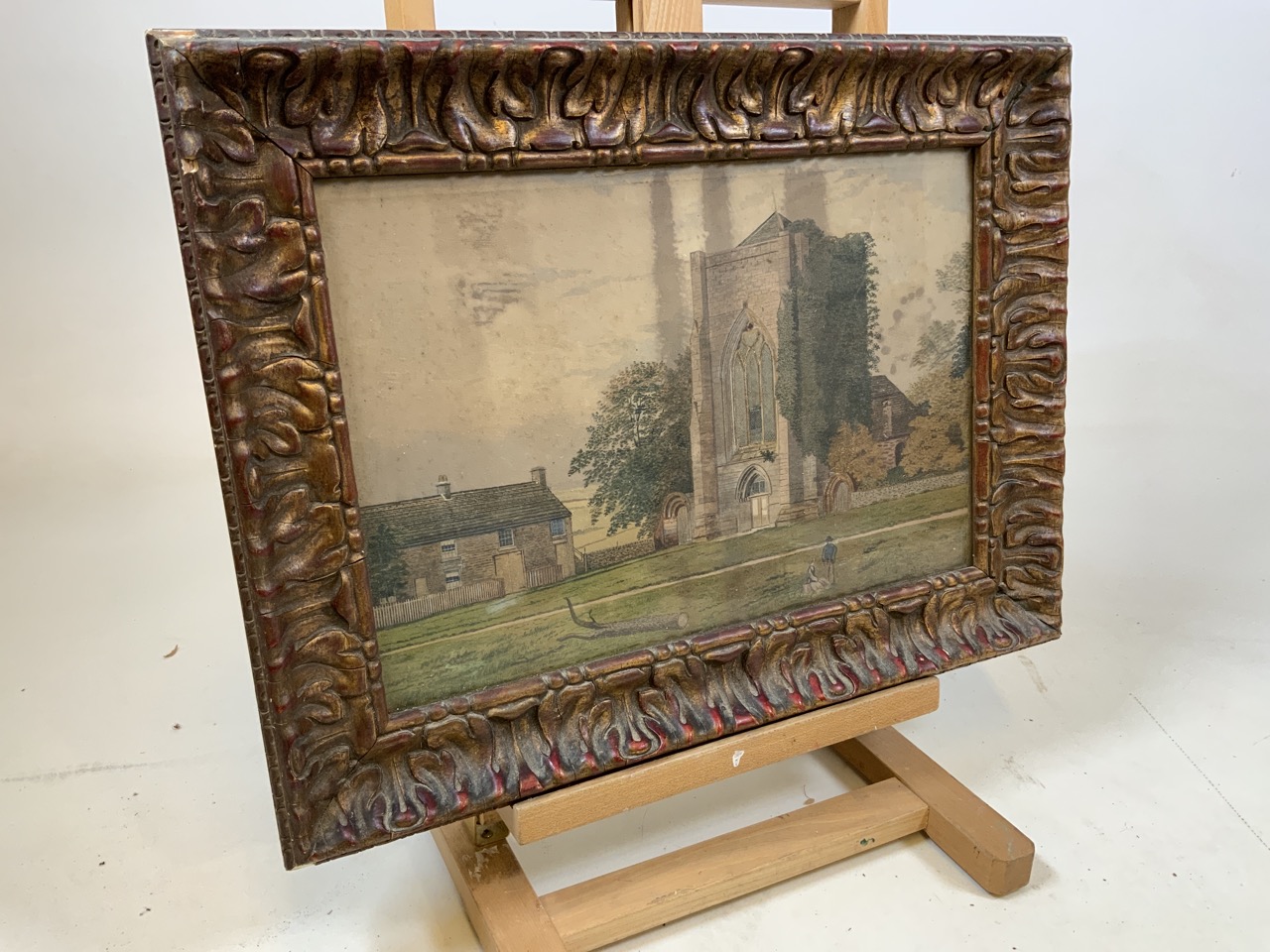 Framed watercolour of small parish church. Signature present, of indeterminate form.W:54cm x H:
