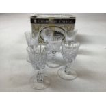 A collection of crystal and cut glass Sherry glasses and tumblers including Edinburgh Crystal