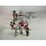 A collection of ceramics to include a large cheese dish, a Royal Doulton Home Again figurine, a