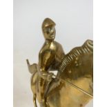 Gilt metal horse and rider in gallop pose. Simulated metal reigns.W:14cm x D:59cm x H:38cm