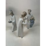 Three Lladro figurines refs 4872, 4868 and 4874 of children in nightdresses. Height approx 20cm.