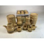 A quantity of Kiln Craft Bacchus stoneware diner ware. Approx 36 mugs saucers and side plates also