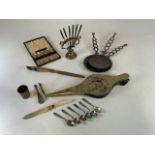 Assortment of antique and vintage items to include cased tea spoons and boar’s foot letter opener.
