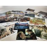 A large collection of film lobby cards to include Mary Poppins, Tess, Educating Rita, The Jungle