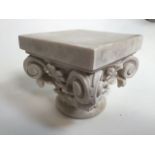 A marble acanthus plinth. Marked B38. W:13cm x D:13cm x H:12cm