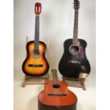 Three acoustic guitars including a Honda model H12B