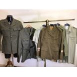 Two Royal Marine dress jackets with one other jacket and trousers ( no buttons but insignia) and