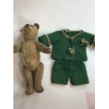 An early 1900s, assumed to be, Stieff bear with original shoe black button eyes and hump back. H: