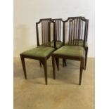 A set of four early 20th century dining chairs with green upholstered seats. Seat height H:46cm