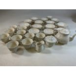 A large quantity of Wedgwood Queens Plain Queens ware to include fourteen soup bowls and plates, tea
