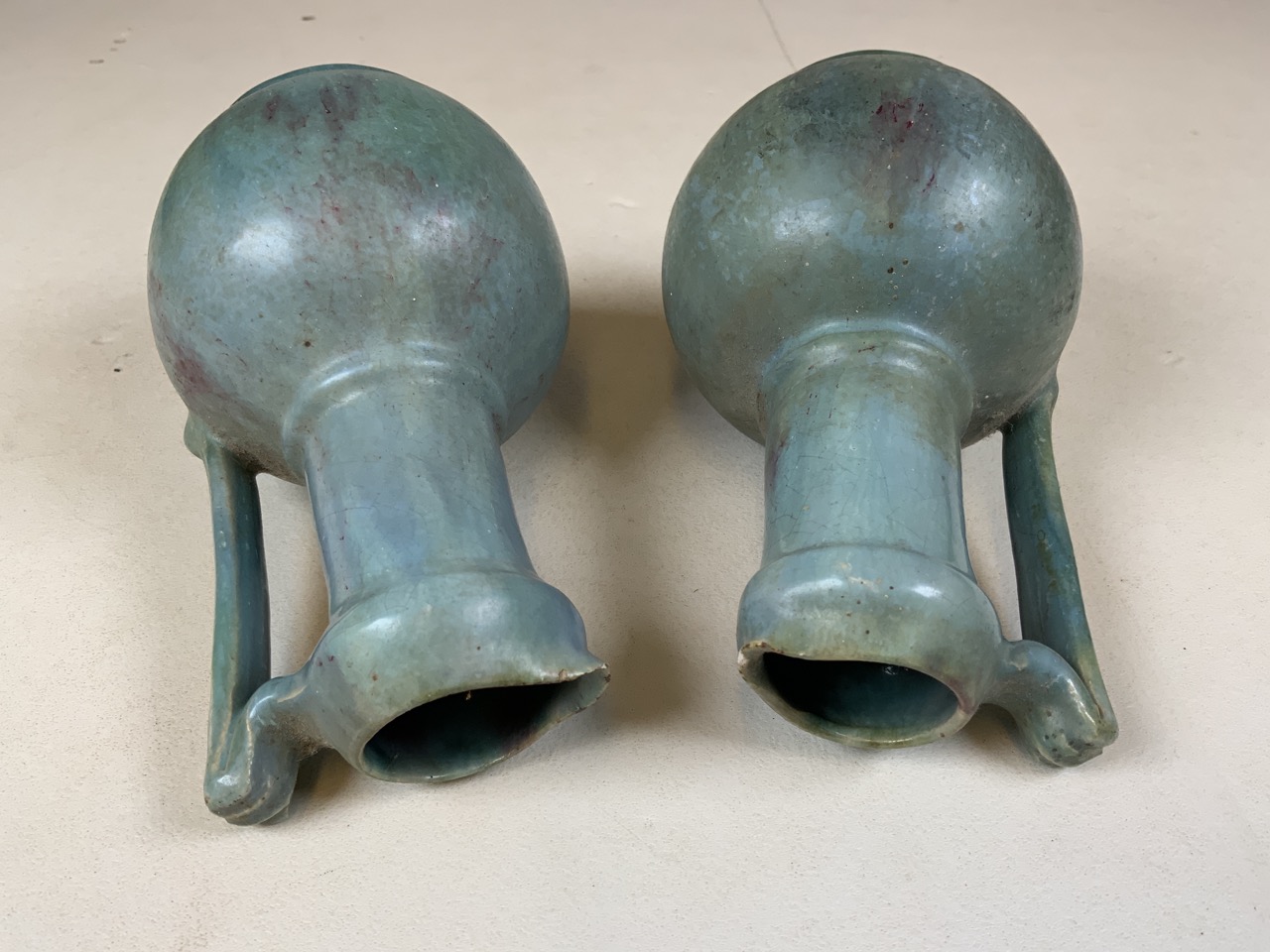 A pair of Ruskin style pottery vases. H:15cm
