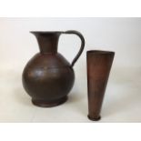 An art nouveau copper jug with vase ( this fits inside the jug and may have been used for holding