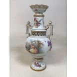A continental Dresden style Wolfsohn vase. Hand painted and gilded with figural and floral