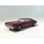 Assortment of vintage Corgi cars and farm models, to include No.276 Oldsmobile Toronado in red