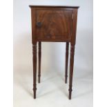 A early 20th century inlaid pot cupboard with brass handle on turned tapered legs. W:38cm x D:35cm x