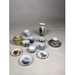 A collection of Royal Worcester items including Millenium cup and saucer. Vase height 16cm