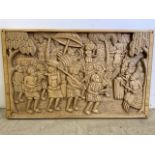 A heavy hard wood carved panel depicting a tribal scene. W:102cm x D:5cm x H:62cm