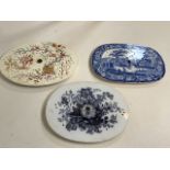 Three nineteenth century meat drainers/mazarines. A hand painted one in an oriental style, a blue