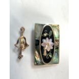 A 9ct gold brooch also with a Mexican mother of pearl brooch.