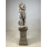 A reconstituted stone lion on square plinth. W:23cm x D:23cm x H:102cm