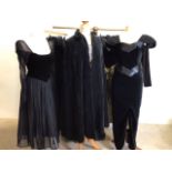 Two Laura Ashley velvet evening dresses together with another six velvet dresses, a cloak and a