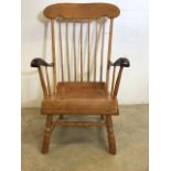 An early 20th century stick back country arm chair. Seat height H:32cm