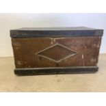 An antique pine chest, metal bound with metal handles leather top and detail to front. W:92cm x D: