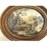An 18th century embroidery on silk in oval frame of a lakeside scene. W:24cm x H:19.5cm