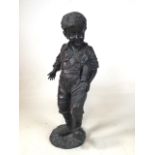 Vintage Bronze statue of young boy playing football. The football itself hand inscribed â€˜David