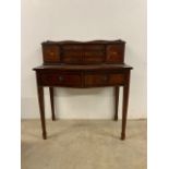 A small inlaid serpentine ladies writing desk with leather top and two drawers and secretaire