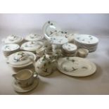 A large quantity of Royal Doulton Coppice . Including four lidded tureen dishes, dinner plates,