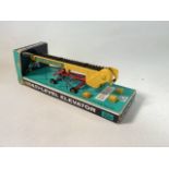 Vintage Britains farm machinery, to include No. 9551 Four Furrow Plough, No. 9564 Multi Level