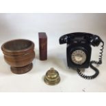 A wall mounted vintage phone, a desk bell, a treen vessel and a book shaped photograph box