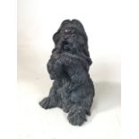 Bronze statue of a Shih Tzu dog posing for its owner. Good detail to coat and pleasing expression.