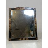 Small Chinese mirror, ebonised frame decorated with Oriental figures. Bevelled glass in good