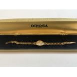 An Orissa Swiss made ladies 9ct watch in original case.