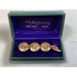 A pair of 14k gold marked cuff links with white metal and mother of pearl fronts. 6.45 total weight