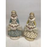 A pair of bisque pottery figures by Mitchellâ€™s pottery H:21cm