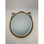 A vintage Peerart bevel edged gilded mirror with original tag and label together with a 1940s