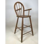 An elm high chair with arms W:43cm x H:88cm