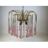 Italian Murano style pink tear drop chandelier c. 1960, with two tiers of pink glass teardrops