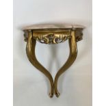 A Small marble topped console shelf with gilt base and drawer. H:60cm W:45cm x D:24cm