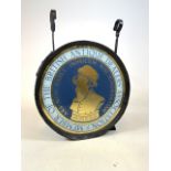 A circular glass double sided sign. Member of the British antique dealers association. With metal