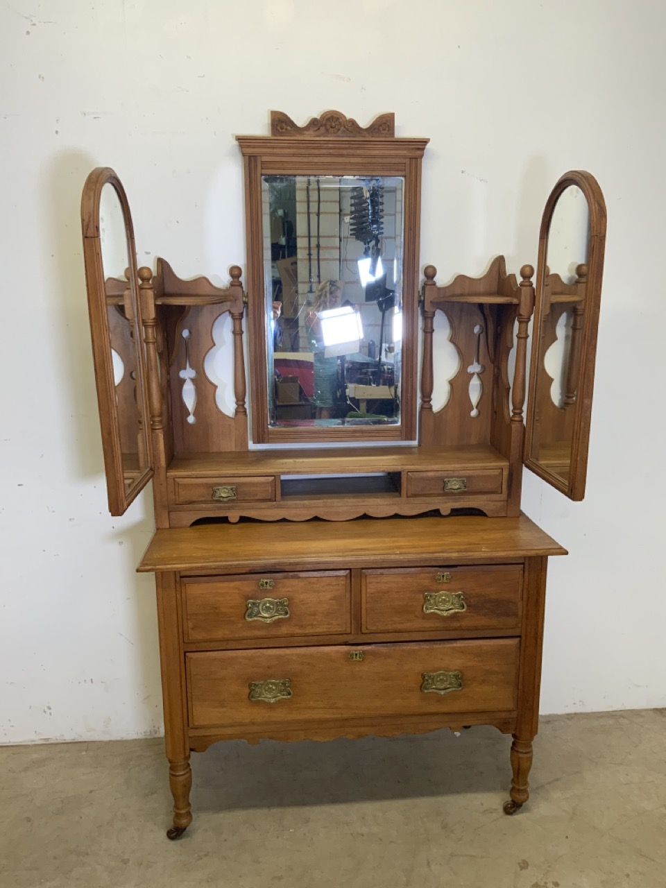 A decorative 20th century dressing chest with three drawers on ceramic castors. Triple mirrored - Image 2 of 6