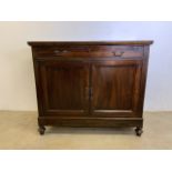 An early 20th century mahogany sideboard with large lockable drawer to top above cupboard. W:119cm x