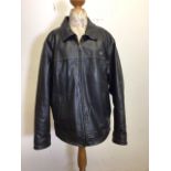 Two leather jackets. One being branded Cockpit USA size large