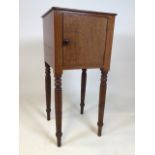 A mahogany pot cupboard on turned legs W:38cm x D:38cm x H:84cm