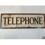 An enamel TELEPHONE sign. W:61cm x H:20.5cm