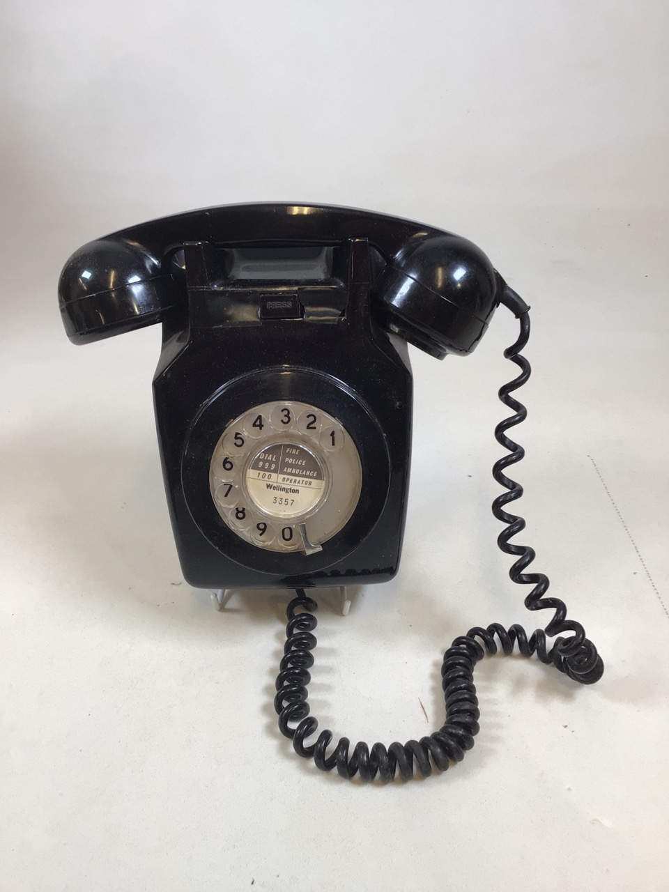 A wall mounted vintage phone, a desk bell, a treen vessel and a book shaped photograph box - Image 3 of 5